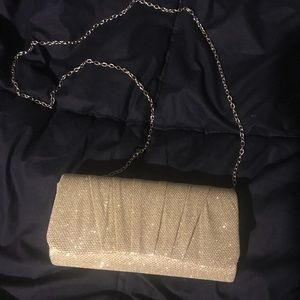 Gold sparkle clutch purse with strap